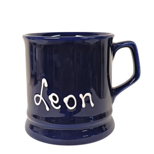 Dark blue English mug inscriptioned with name
